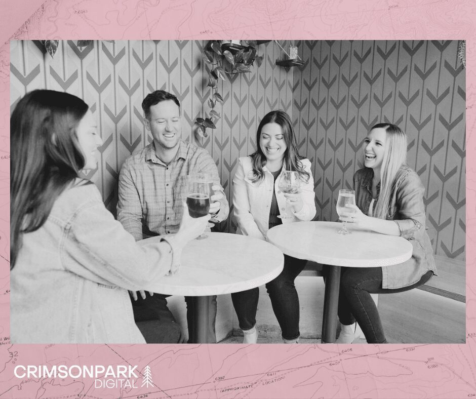 The Crimson Park Digital team does cheers with drinks